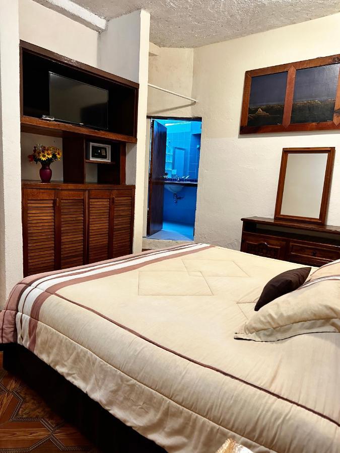 Bungalows Andrea เตโปซตลัน ภายนอก รูปภาพ
